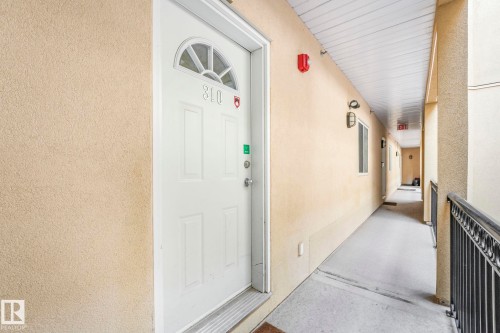 Doorway to property with stucco siding - 310 10606 102 Avenue, Edmonton, AB - Outdoor With Exterior