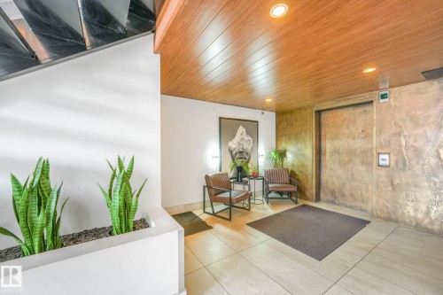 Community lobby with recessed lighting, wood ceiling, and wood walls - 310 10606 102 Avenue, Edmonton, AB -  Photo Showing Other Room