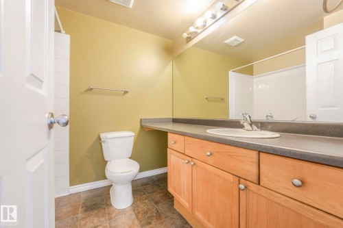 Bathroom with vanity and a shower - 310 10606 102 Avenue, Edmonton, AB - Indoor Photo Showing Bathroom