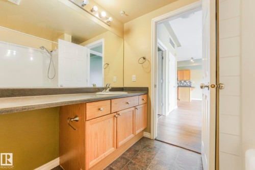 Full bathroom with vanity and a shower - 310 10606 102 Avenue, Edmonton, AB - Indoor Photo Showing Bathroom