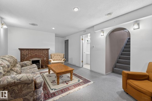 17 Brookside Crescent, Spruce Grove, AB - Indoor Photo Showing Living Room With Fireplace