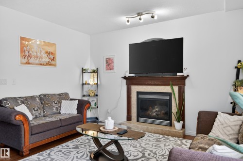 15408 49 Street, Edmonton, AB - Indoor Photo Showing Living Room With Fireplace