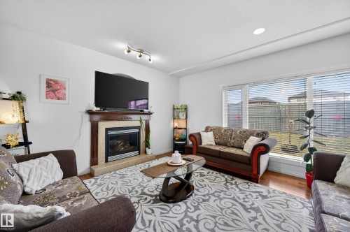 15408 49 Street, Edmonton, AB - Indoor Photo Showing Living Room With Fireplace