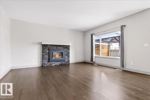 5912 19 Avenue, Edmonton, AB - Indoor Photo Showing Living Room With Fireplace