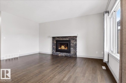 5912 19 Avenue, Edmonton, AB - Indoor Photo Showing Living Room With Fireplace