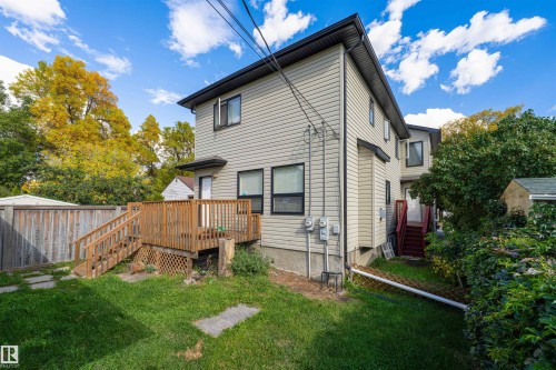 Rear view of house featuring a deck and stairs - 12246 103 Street Nw, Edmonton, AB - Outdoor With Deck Patio Veranda