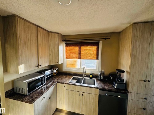 11452 152B Avenue, Edmonton, AB - Indoor Photo Showing Kitchen With Double Sink