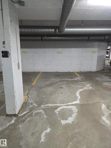 Underground parking space with designated yellow demarcation lines - 344 1520 Hammond Gate Gate, Edmonton, AB - Indoor Photo Showing Garage