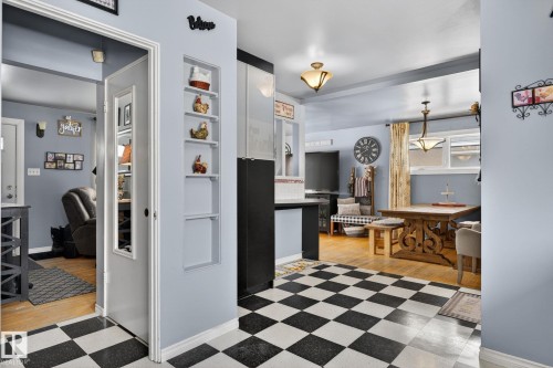 Checkered tile flooring with light blue wall color - 9112 130 Avenue, Edmonton, AB - Indoor