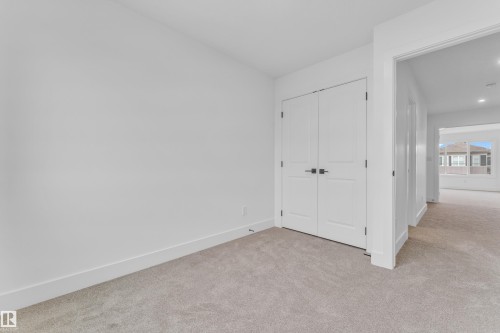 Neutral tone wall finishes - 277 Munn Way, Leduc, AB - Indoor Photo Showing Other Room
