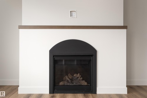 8 Darby Crescent, Spruce Grove, AB - Indoor Photo Showing Living Room With Fireplace