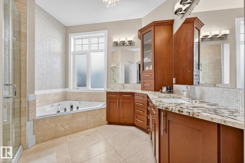 Bathroom featuring a shower stall, a bath, and vanity - 940 Haliburton Road, Edmonton, AB - Indoor Photo Showing Bathroom