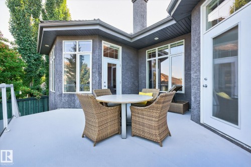 View of patio / terrace with outdoor dining space - 940 Haliburton Road, Edmonton, AB - Outdoor With Exterior