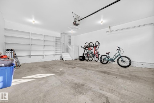 Garage with a garage door opener - 940 Haliburton Road, Edmonton, AB - Indoor Photo Showing Garage