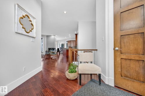 Foyer entrance with recessed lighting and dark wood finished floors - 940 Haliburton Road, Edmonton, AB - Indoor Photo Showing Other Room