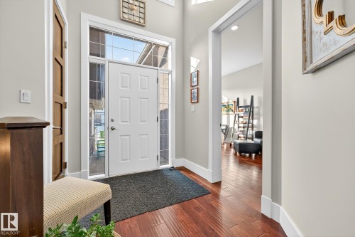 Foyer entrance featuring dark wood finished floors, a towering ceiling, and recessed lighting - 940 Haliburton Road, Edmonton, AB - Indoor Photo Showing Other Room