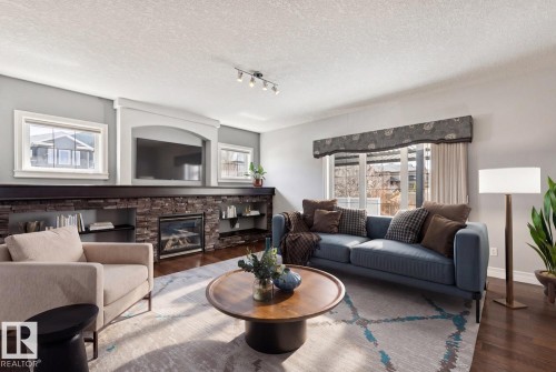 2665 Watcher Way, Edmonton, AB - Indoor Photo Showing Living Room With Fireplace
