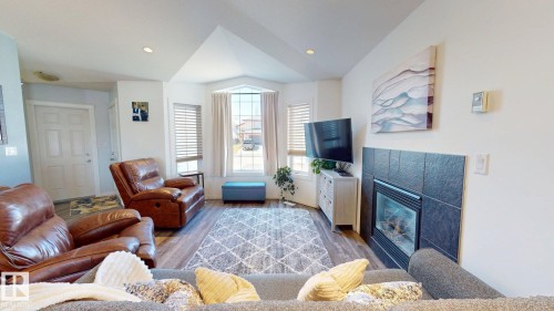 4465 38 St, Drayton Valley, AB - Indoor Photo Showing Living Room With Fireplace