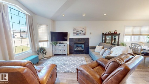 4465 38 St, Drayton Valley, AB - Indoor Photo Showing Living Room With Fireplace