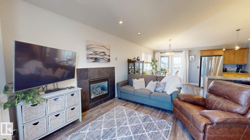4465 38 St, Drayton Valley, AB - Indoor Photo Showing Living Room With Fireplace
