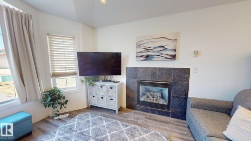4465 38 St, Drayton Valley, AB - Indoor Photo Showing Living Room With Fireplace