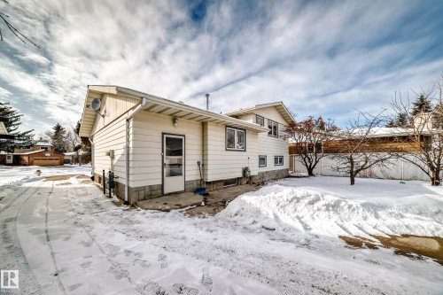 The property features white siding and a sloped roof - 8733 181A Street Nw, Edmonton, AB - Outdoor