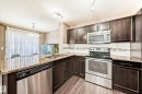 23 445 Brintnell Boulevard, Edmonton, AB  - Indoor Photo Showing Kitchen With Double Sink With Upgraded Kitchen 