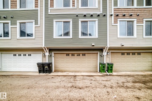 Multi-unit residential facade featuring horizontal siding and shaker-style accents - 69 3625 144 Avenue, Edmonton, AB - Outdoor