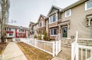 Townhome exterior featuring varied siding materials, including horizontal panels and shake accents - 69 3625 144 Avenue, Edmonton, AB  - Outdoor With Facade 
