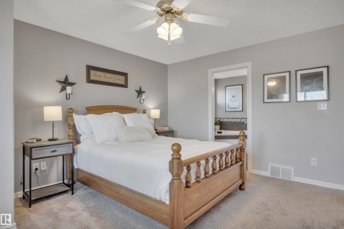 110 Windrose Drive, Leduc, AB - Indoor Photo Showing Bedroom