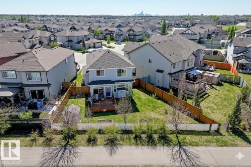 Some photos were AI enhanced to remove snow. - 16520 136 Street, Edmonton, AB - Outdoor With Facade