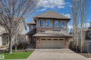 Two-story residence featuring a shingled roof and a stone and siding facade - 1110 Armitage Crescent, Edmonton, AB  - Outdoor With Facade 