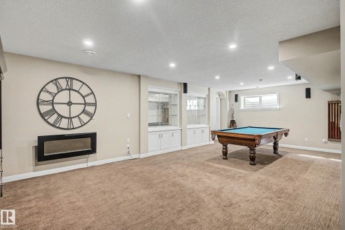 Spacious recreational room featuring recessed lighting and wall-to-wall carpeting - 1110 Armitage Crescent, Edmonton, AB 
