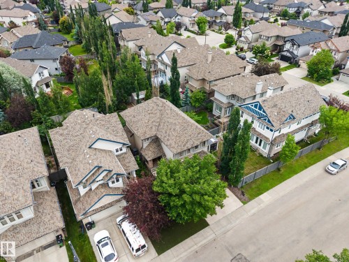 Residential street featuring a collection of multi-story homes with varied architectural styles - 1110 Armitage Crescent, Edmonton, AB 