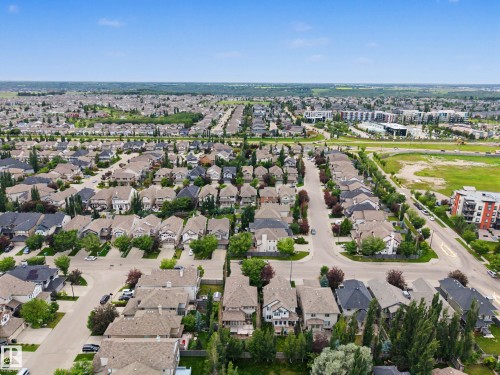 Expansive residential neighborhood with varied architectural styles, mature landscaping, and tree-lined streets - 1110 Armitage Crescent, Edmonton, AB 
