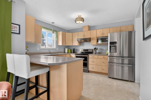 27 225 Blackburn Drive E, Edmonton, AB - Indoor Photo Showing Kitchen With Double Sink