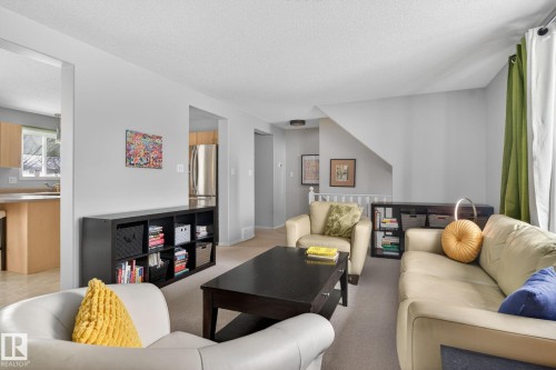 27 225 Blackburn Drive E, Edmonton, AB - Indoor Photo Showing Living Room