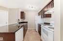 404 12025 22 Avenue Sw, Edmonton, AB  - Indoor Photo Showing Kitchen With Double Sink 