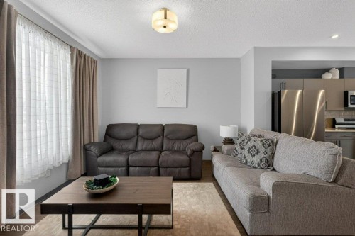 2405 Trumpeter Way, Edmonton, AB - Indoor Photo Showing Living Room