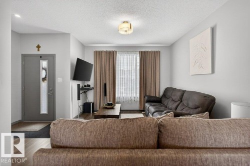 2405 Trumpeter Way, Edmonton, AB - Indoor Photo Showing Living Room