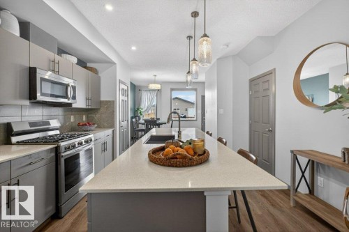 2405 Trumpeter Way, Edmonton, AB - Indoor Photo Showing Kitchen With Upgraded Kitchen