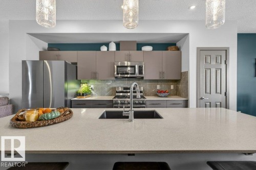 2405 Trumpeter Way, Edmonton, AB - Indoor Photo Showing Kitchen With Stainless Steel Kitchen With Upgraded Kitchen