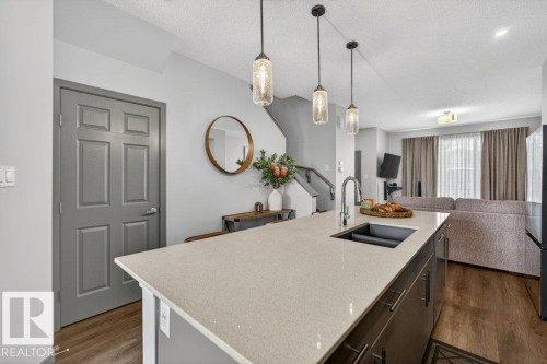 2405 Trumpeter Way, Edmonton, AB - Indoor Photo Showing Kitchen With Double Sink With Upgraded Kitchen