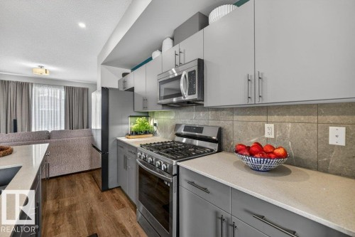 2405 Trumpeter Way, Edmonton, AB - Indoor Photo Showing Kitchen With Stainless Steel Kitchen With Upgraded Kitchen