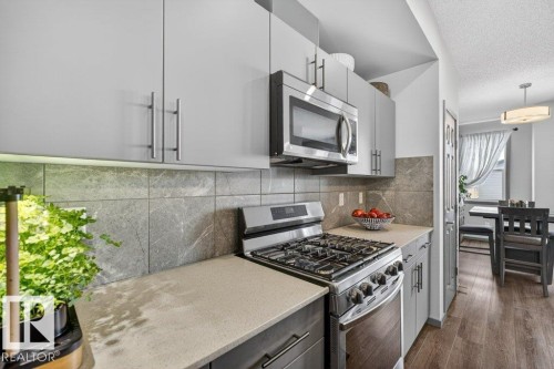 2405 Trumpeter Way, Edmonton, AB - Indoor Photo Showing Kitchen With Upgraded Kitchen