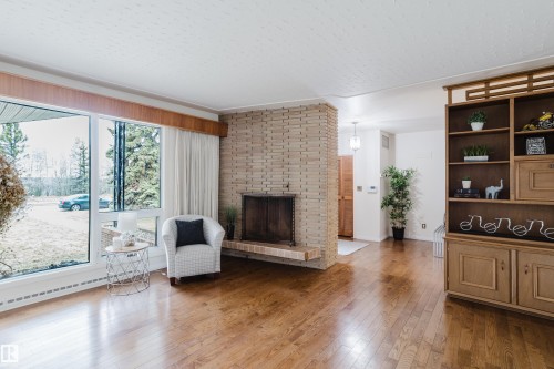 7907 Saskatchewan Drive, Edmonton, AB - Indoor Photo Showing Other Room With Fireplace