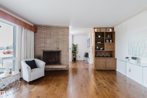 7907 Saskatchewan Drive, Edmonton, AB - Indoor Photo Showing Living Room With Fireplace