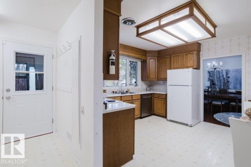 7907 Saskatchewan Drive, Edmonton, AB - Indoor Photo Showing Kitchen With Double Sink