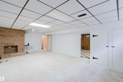 7907 Saskatchewan Drive, Edmonton, AB - Indoor Photo Showing Other Room With Fireplace