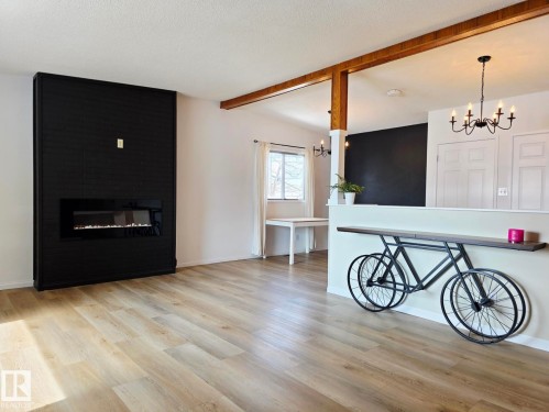 5204 43 Avenue, Leduc, AB - Indoor Photo Showing Living Room With Fireplace